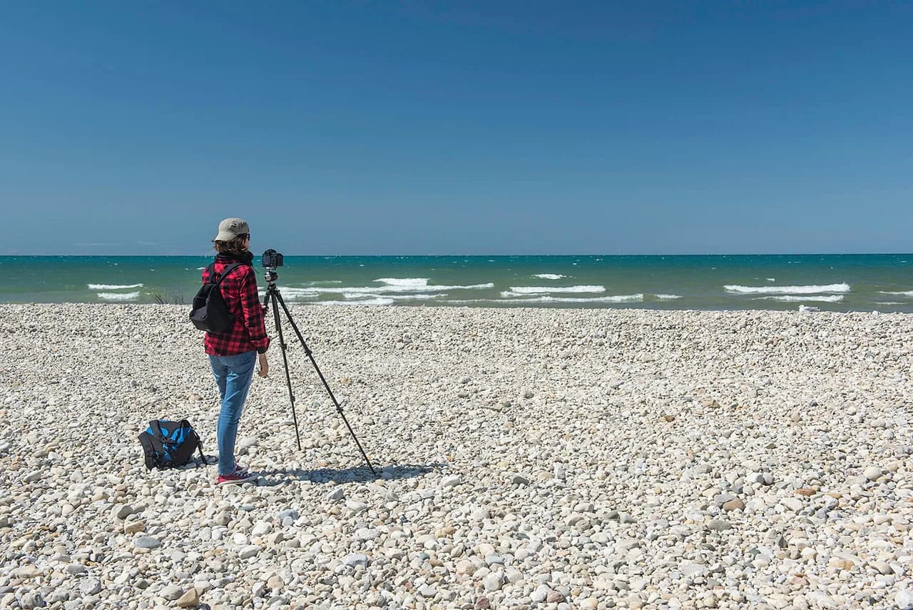 Jody van der Kwaak photographing - photo by Greg Coman
