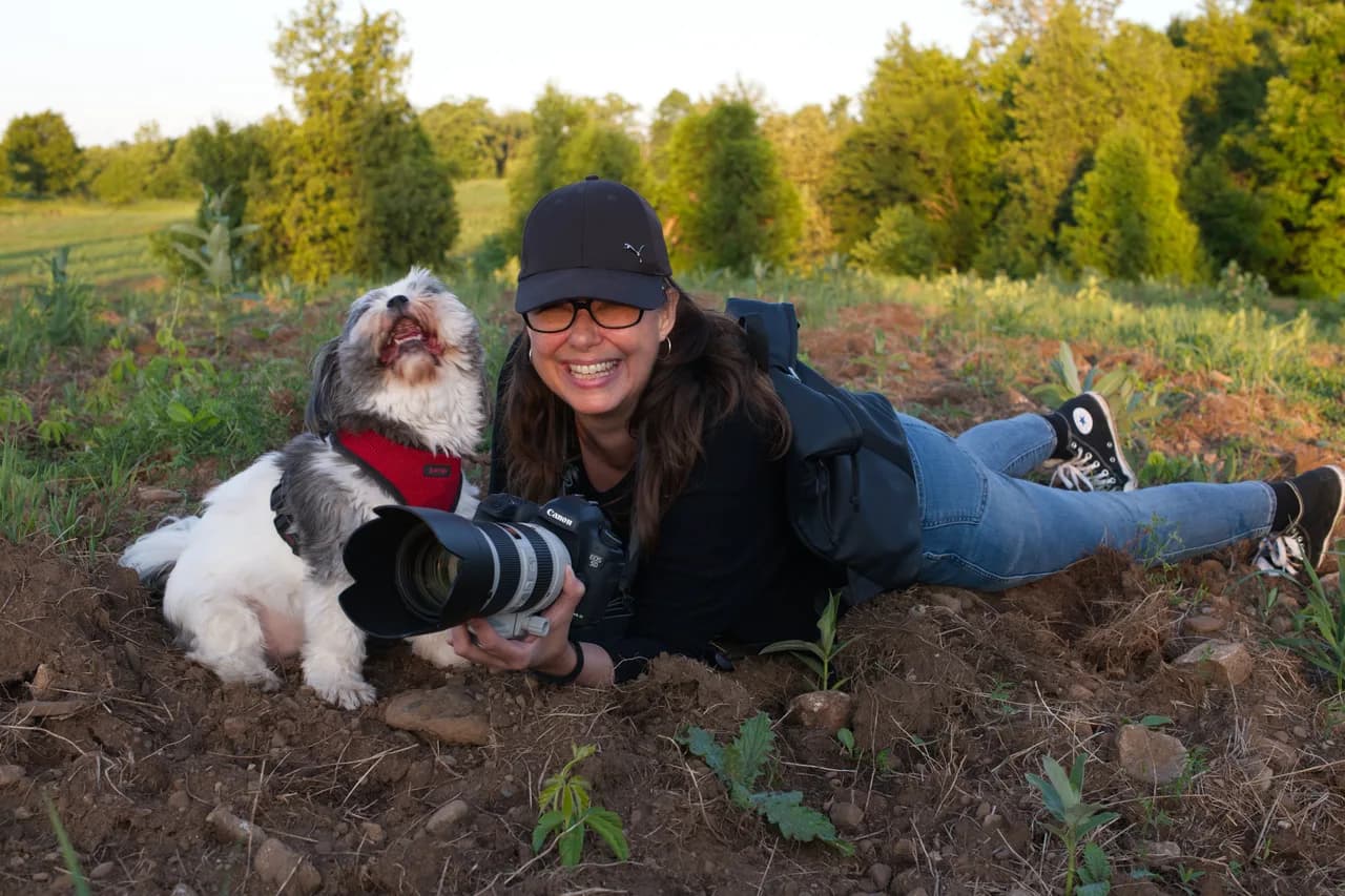Jody van der Kwaak photographing - photo by Greg Coman
