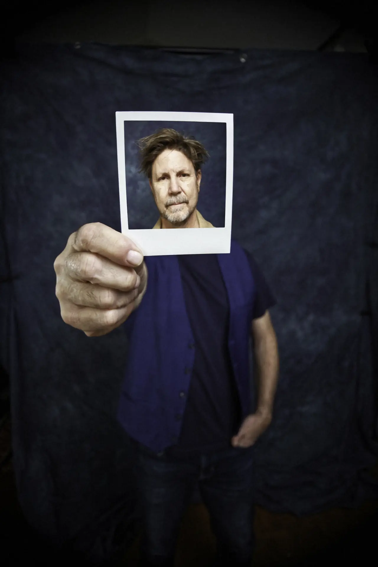 Greg Coman with polaroid - artistic portrait by Kwaak Photography